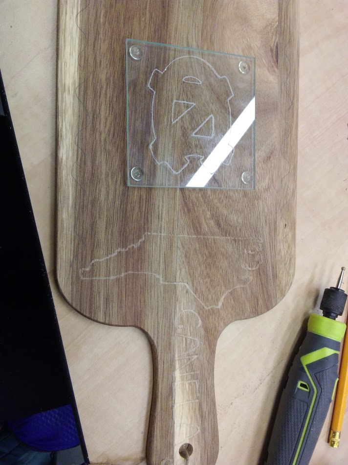 Martinez Leal created this wood/glass engraving in the BeAM MakerSpace