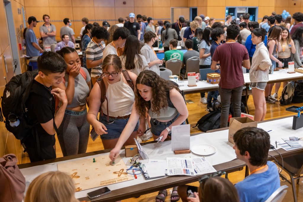 Students play a game at MakerFest